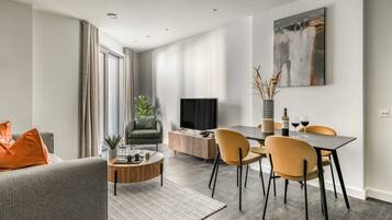 Apartment, 1 Bedroom | Living area | Smart TV