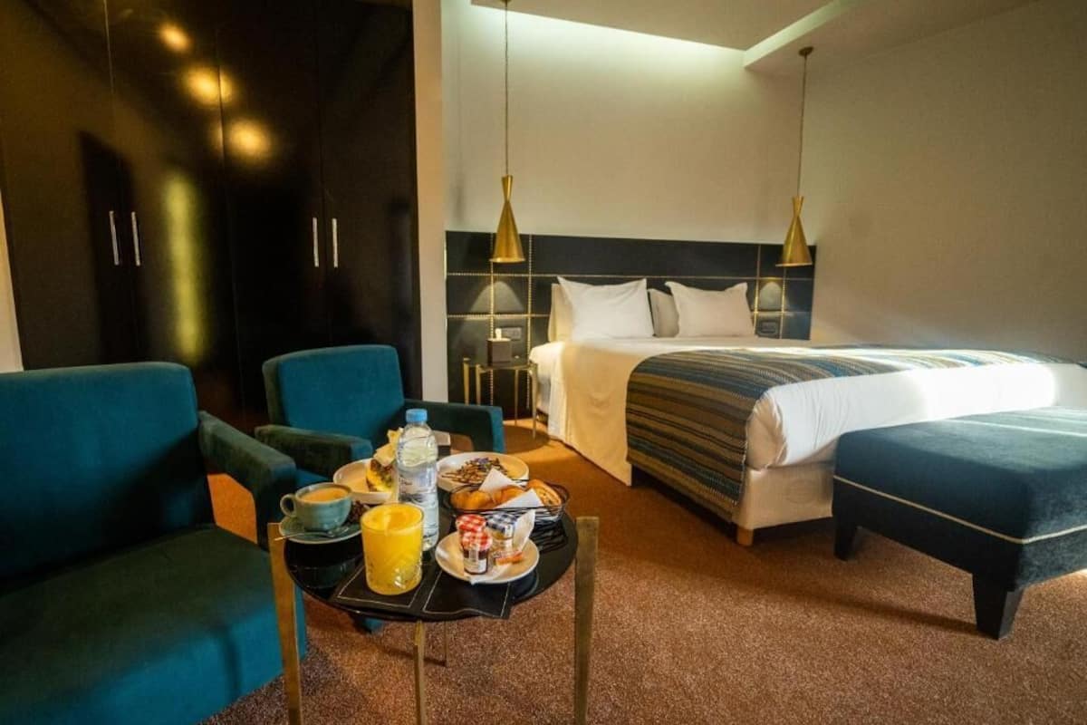 Superior Room, 1 King Bed | 1 bedroom, in-room safe, desk, iron/ironing board