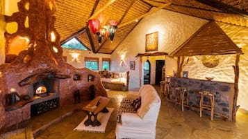 Luxury Villa | Living area | 50-inch flat-screen TV with digital channels, fireplace