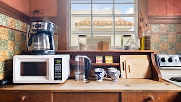 Fridge, cookware/dishes/utensils, dining tables