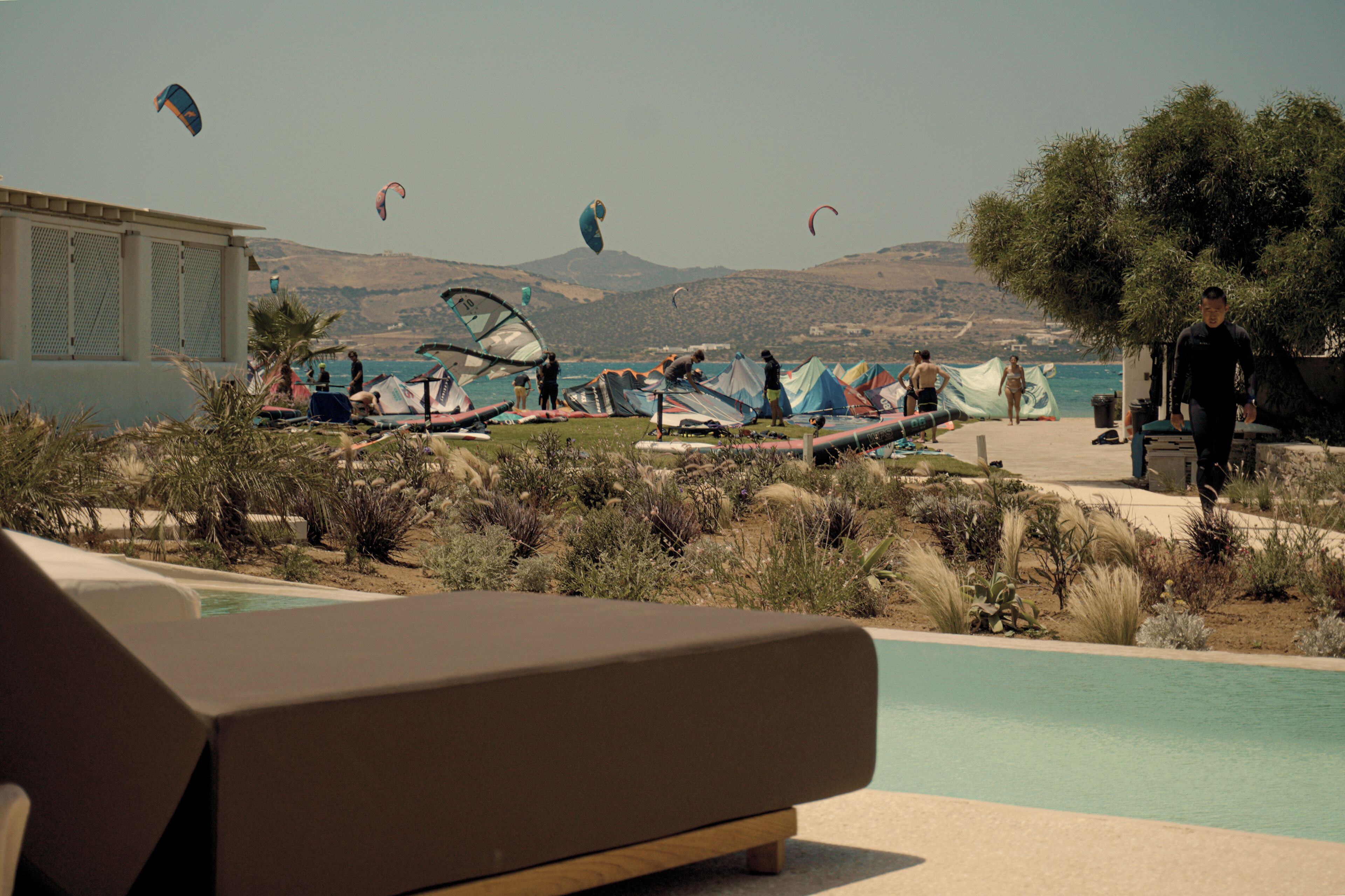 On the beach, beach towels, snorkelling, windsurfing