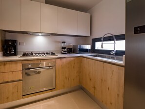 Fridge, microwave, oven, stovetop - Beautiful new condo next to the beach. (Punta Cana)