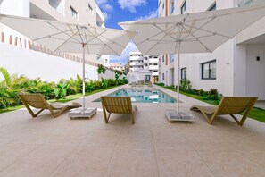 Pool - Beautiful new condo next to the beach. (Punta Cana)