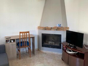 Fernseher, Kamin