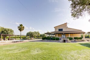 A two-story house with a patio, a swimming pool, and a covered outdoor seating area. - Son Mieres by Rentallorca (Petra)
