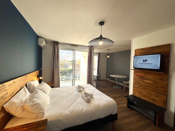 Studio | Desk, laptop workspace, blackout curtains, soundproofing