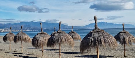 On the beach, sun-loungers, beach towels