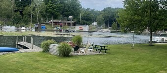 The Bay Cottage has wonderful views of Hamlin lake from its deck 50’ from lake