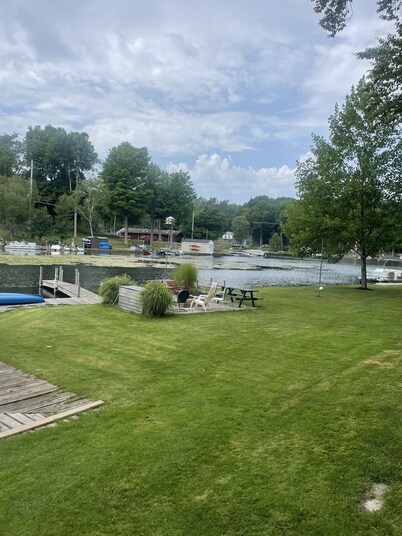 The Bay Cottage has wonderful views of Hamlin lake from its deck 50’ from lake