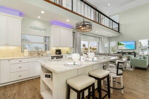 House, 3 Bedrooms | Private kitchen | Fridge, oven, coffee/tea maker, toaster - Reel 'em Inn - Oak St 3 Bedroom Home by RedAwning (Fort Myers Beach)