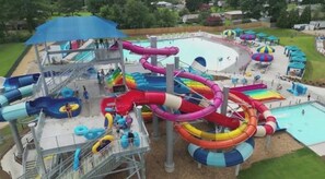 A water park with multiple slides and pools.