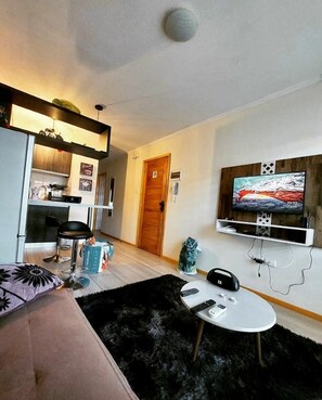 Family Apartment (A) | Living area | Flat-screen TV