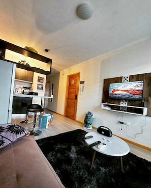 Family Apartment (A) | Living area | Flat-screen TV