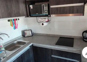 Full-sized fridge, microwave, toaster, blender