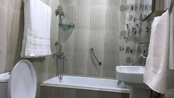 Hair dryer, bidet, towels, soap