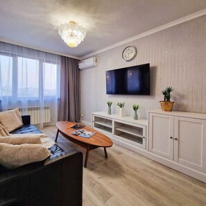 Living area - Apartment complex Arbat,one bedroom studio apartment with mountain views (Almaty)