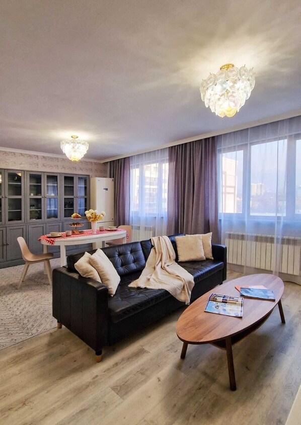 Living area - Apartment complex Arbat,one bedroom studio apartment with mountain views (Almaty)