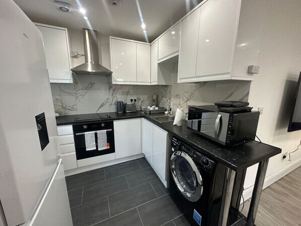 Fridge, microwave, oven, toaster