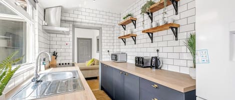Microwave, stovetop, coffee/tea maker, toaster