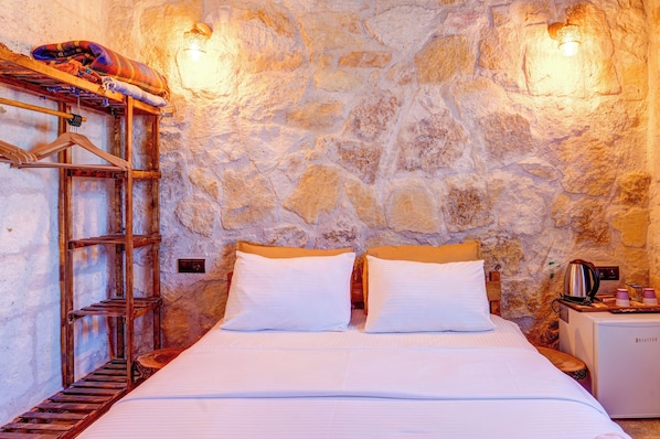 Habitació Deluxe | Llençols de cotó egipci, roba de llit d'alta qualitat i cobrellits