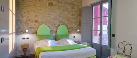 1 bedroom, desk, iron/ironing board, travel crib