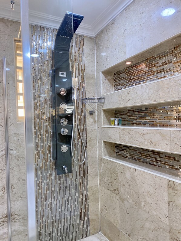 Premium Apartment | Bathroom | Jetted bath, rainfall showerhead, free toiletries, slippers