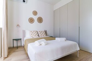 1 habitación, tabla de planchar con plancha, wifi gratis y ropa de cama 