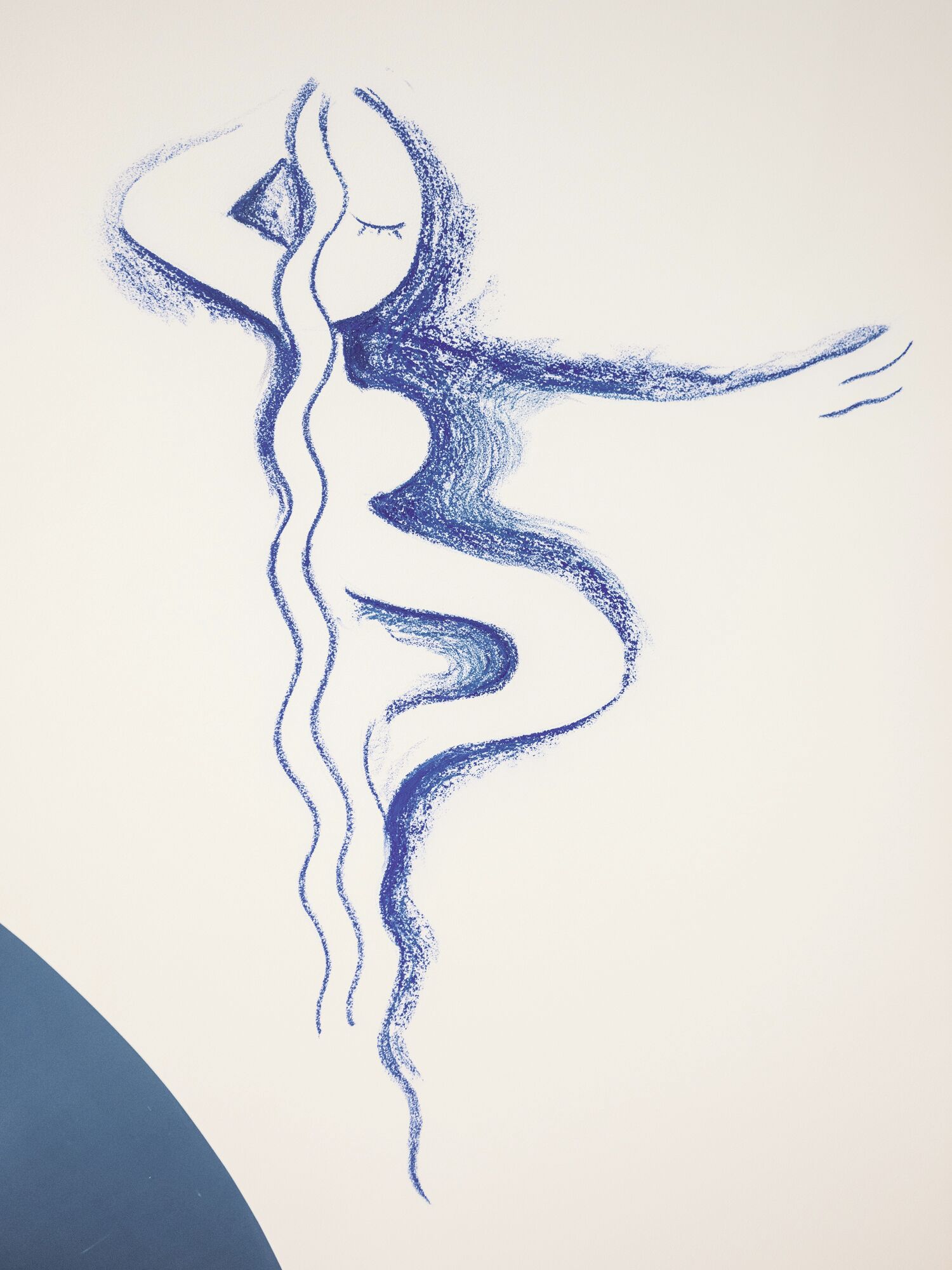 A blue abstract figure on a white background.