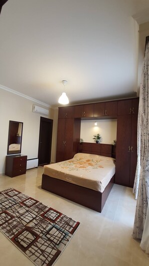 1 غرفة نوم وواي فاي وملاءات أسرّة