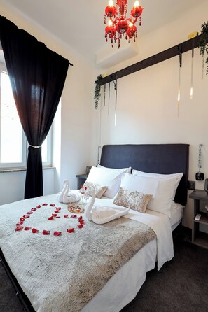 1 Schlafzimmer, Zimmersafe, Schreibtisch, Bügeleisen/Bügelbrett