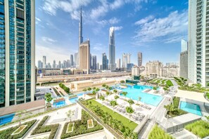 Outdoor pool - Burj Khalifa View | 2BR with Private Balcony (Downtown)
