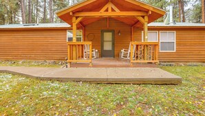 A wooden cabin with a porch, two windows, and a door. - Bayfield Retreat, 9 Mi to Vallecito Reservoir! (Bayfield)