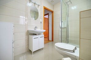 Hair dryer, towels, soap, toilet paper