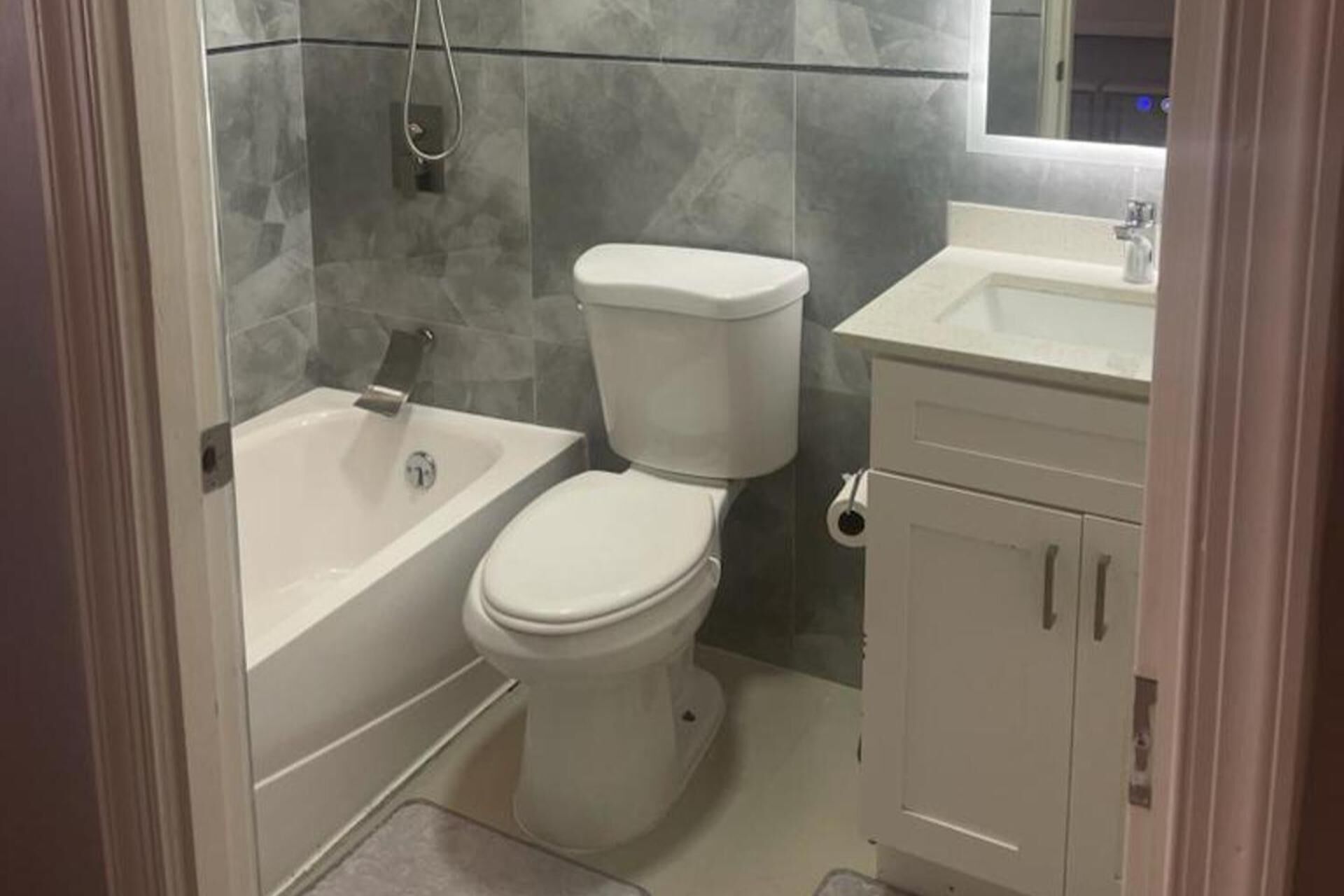 Separate tub and shower, deep soaking tub, towels