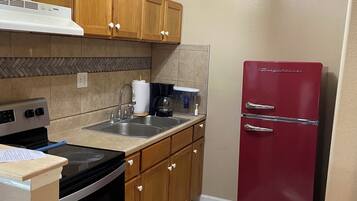 Fridge, microwave, oven, cookware/dishes/utensils