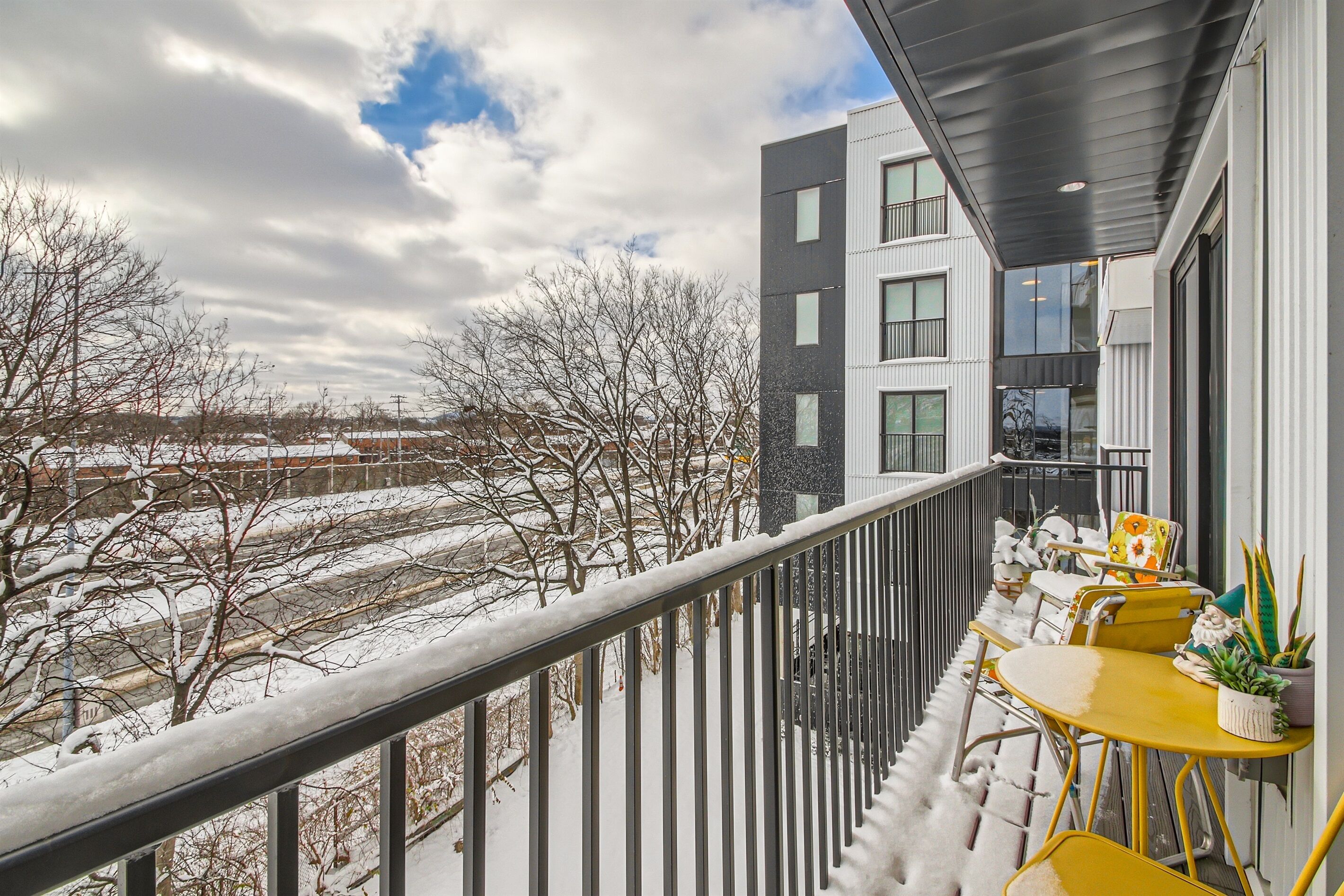 Feel the neighborhood's pulse from the private balcony.