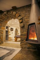 Superior Studio Suite | Living area | 50-inch LCD TV with satellite channels, fireplace