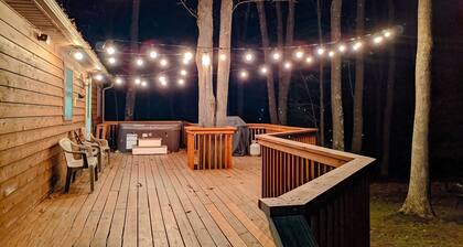 Peaceful hideaway with large yard, hot tub, grill, firepit, smart TVs, & AC