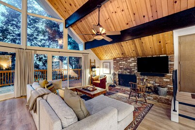 Enchanting lake retreat with fireplace, games, & great deck views - dog-friendly