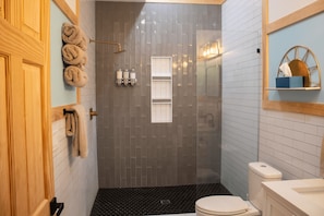 Shower, hair dryer, towels, soap