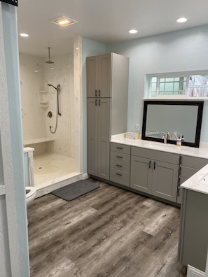 Shower, hair dryer, towels, soap