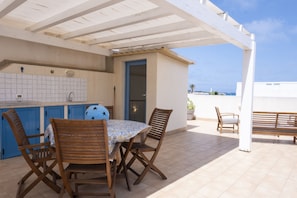 Outdoor dining - Casa Greta a stone's throw from the sea (San Vito Lo Capo)