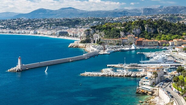 A coastal cityscape with a prominent lighthouse, marina, and historic buildings. - Sublime flat, city centre, modern, balconies, air conditioning, refurbished (Nice)