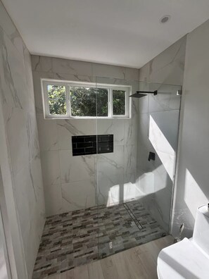 Shower, towels, soap, shampoo