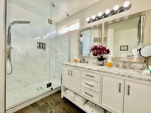 Shower, hair dryer, towels, soap