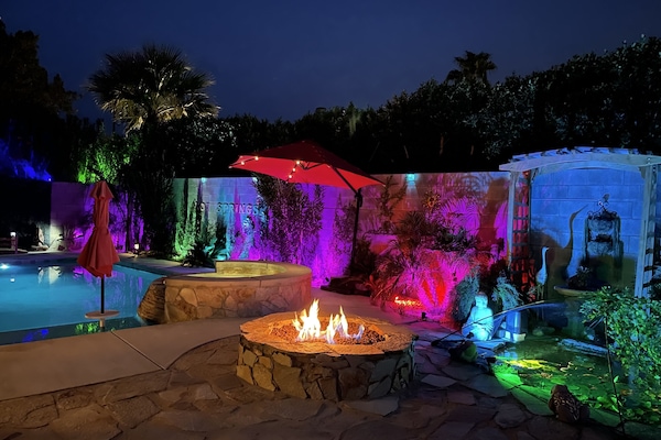 Oversized heated mineral saltwater pool & spa, koi pond, gas fire-pit at night