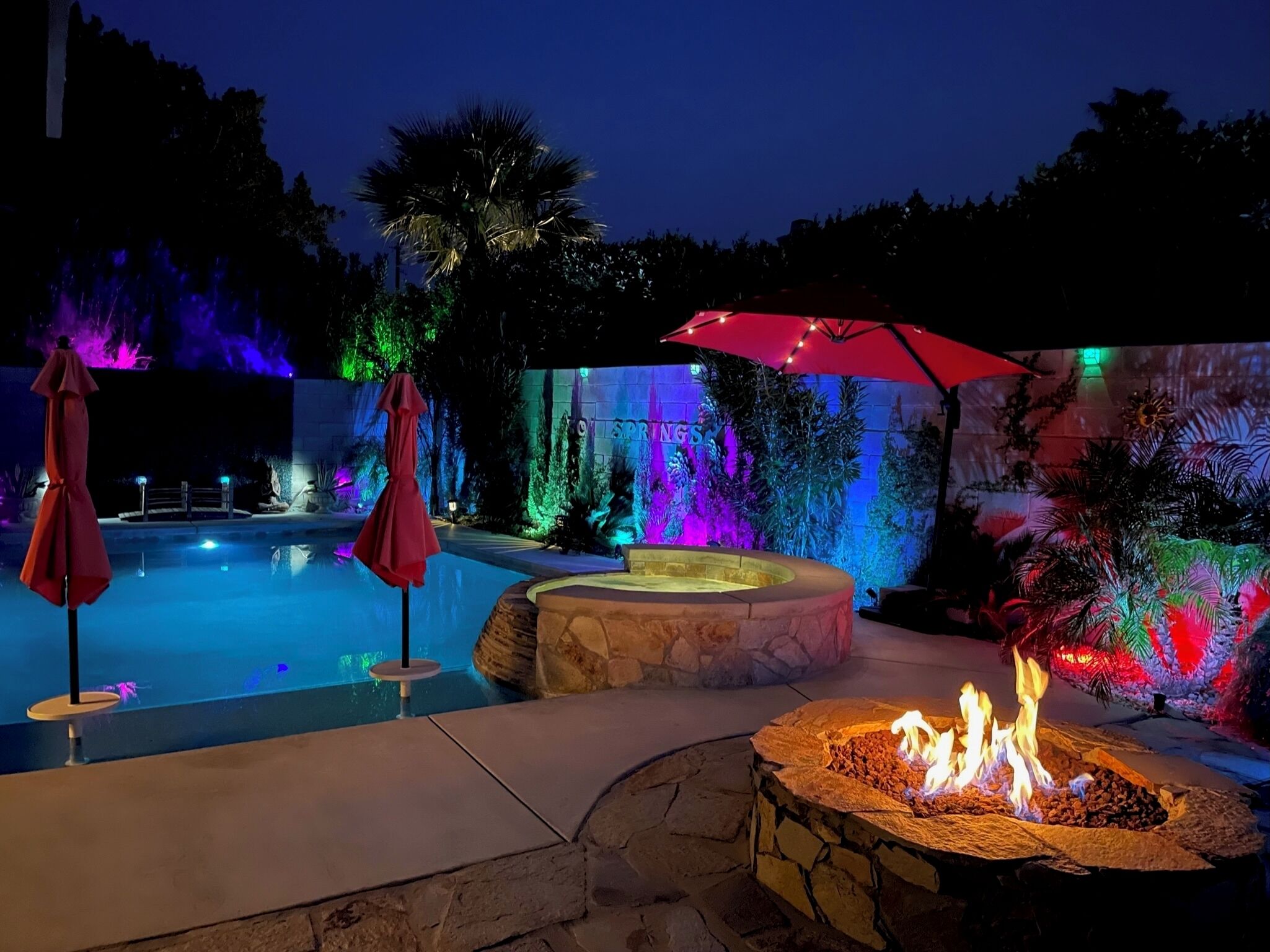 Heated mineral saltwater pool and spa with gas firepit and koi pond