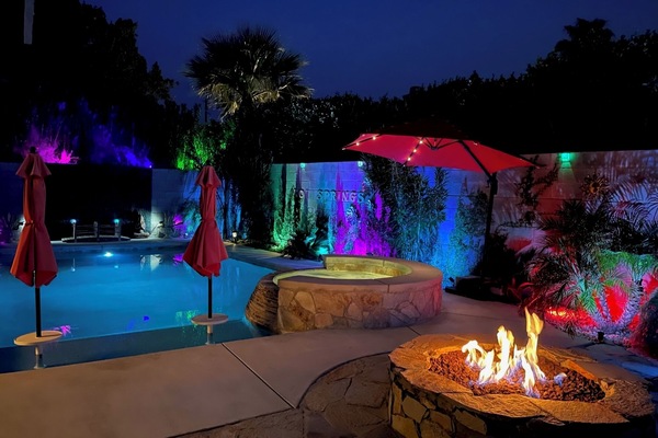 Heated mineral saltwater pool and spa with gas firepit and koi pond