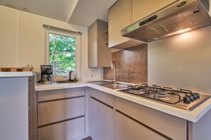 Fridge, microwave, stovetop, coffee/tea maker