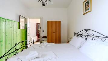 2 habitaciones y ropa de cama